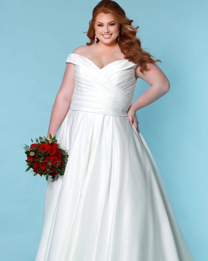 Front of a model wearing a size 18 Veronica Wedding Dress in Ivory by Sydney's Closet. | dia_product_style_image_id:250604